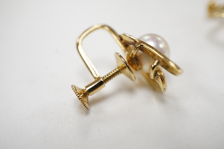 A pair of Mikimoto 14k yellow metal and single stone cultured pearl set ear clips, 17mm, together with a 14k yellow metal and single stone cultured pearl set ring.